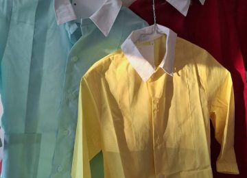 rewrite this title Grembiuli colorati alla scuola dell'Infanzia di Torrita di Siena: "Iniziativa per superare stereotipi di genere"in Italian